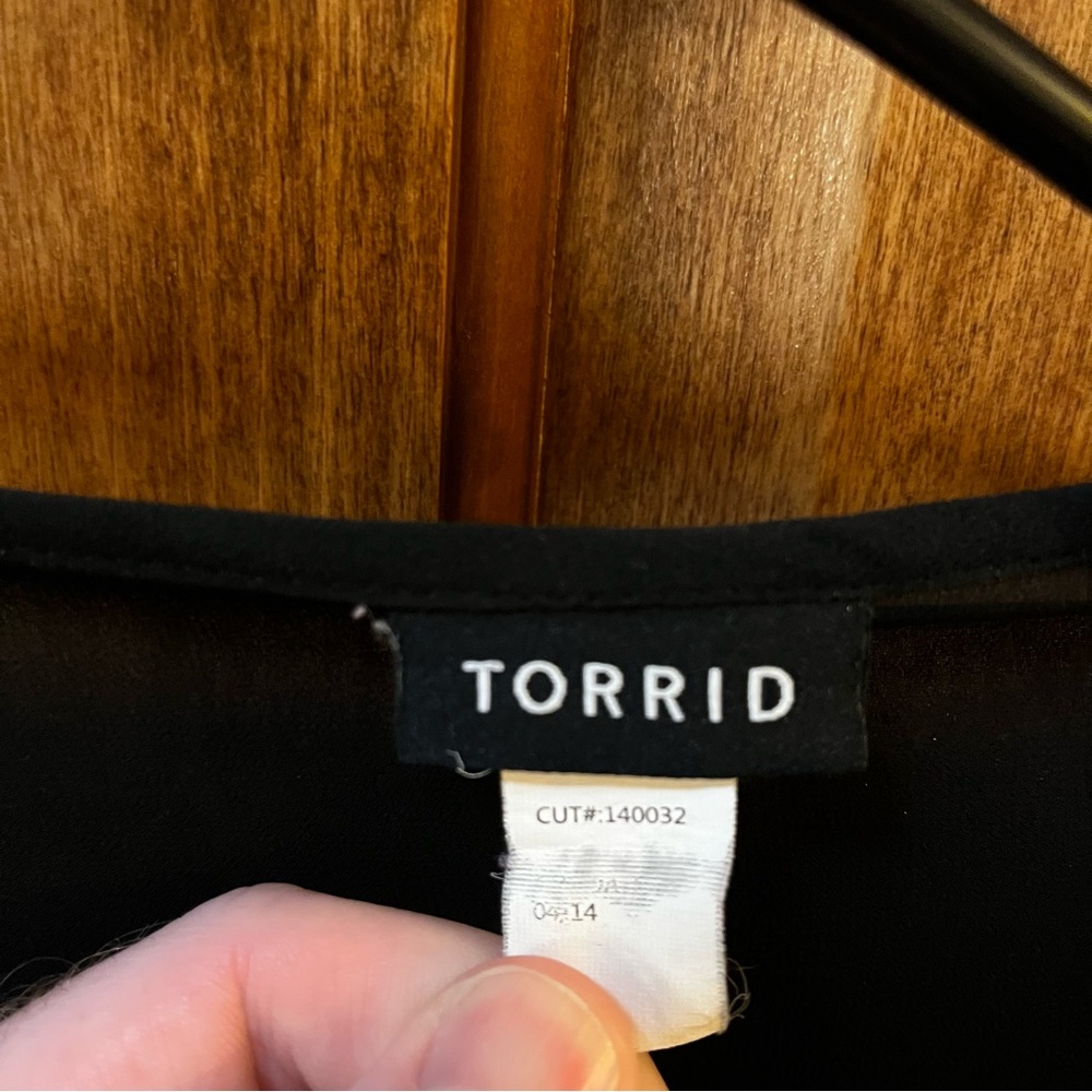 Torrid Sheer Long Sleeved Crossover Top with Banded Hem and Button Cuff Black 1X - Picture 2 of 3